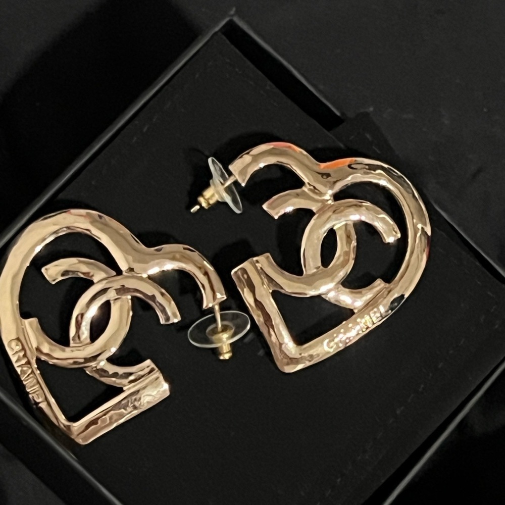 New Chanel hammered heart earrings, and champagne gold. Massive hearts
